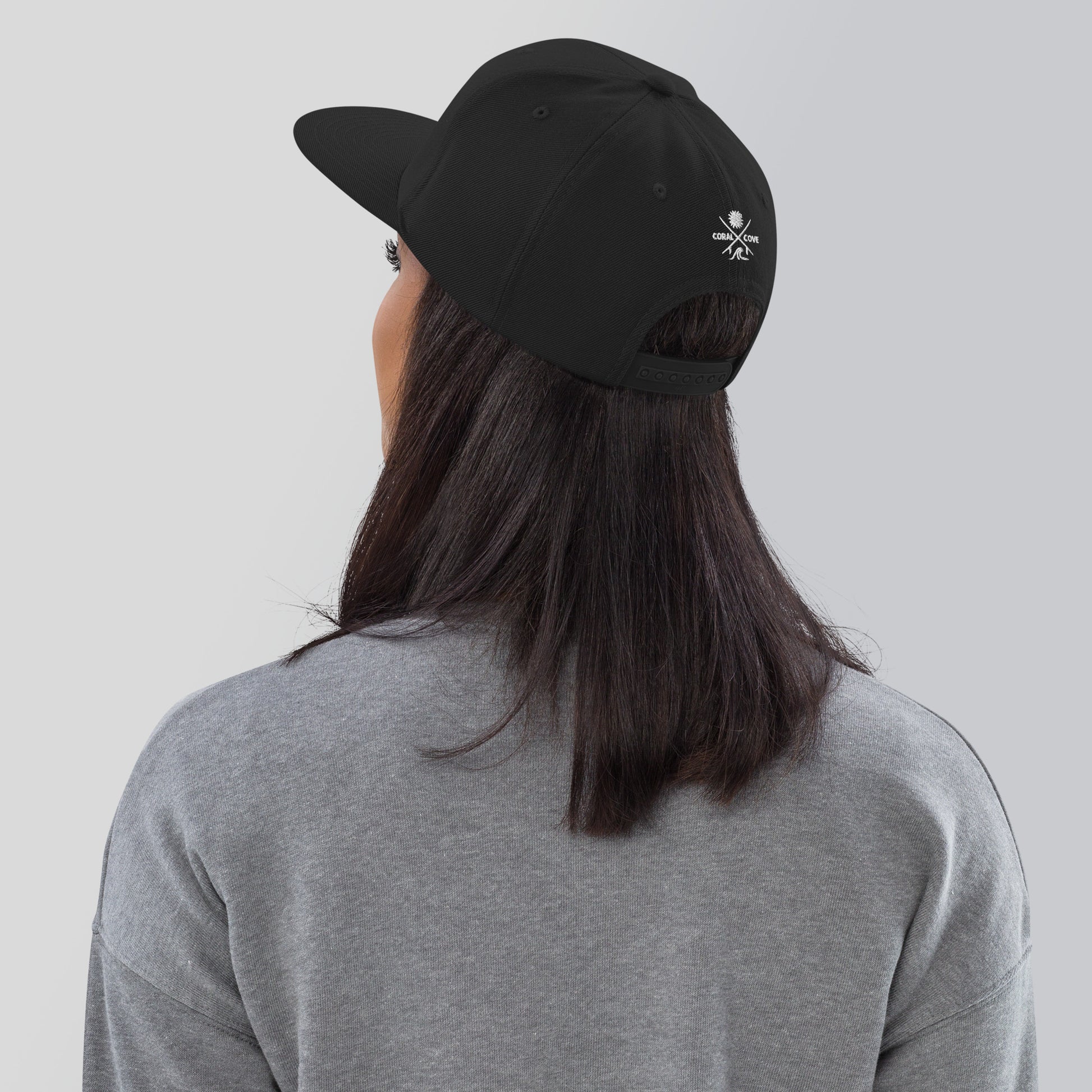 Woman Wearing The Cove Snapback